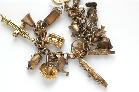 Appraisal: CT GOLD CHARM BRACELET WITH ASSORTED CT AND CT GOLD