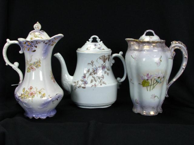 Appraisal: Two Porcelain Chocolate Pots one floral enamel marked Victoria Carlsbad