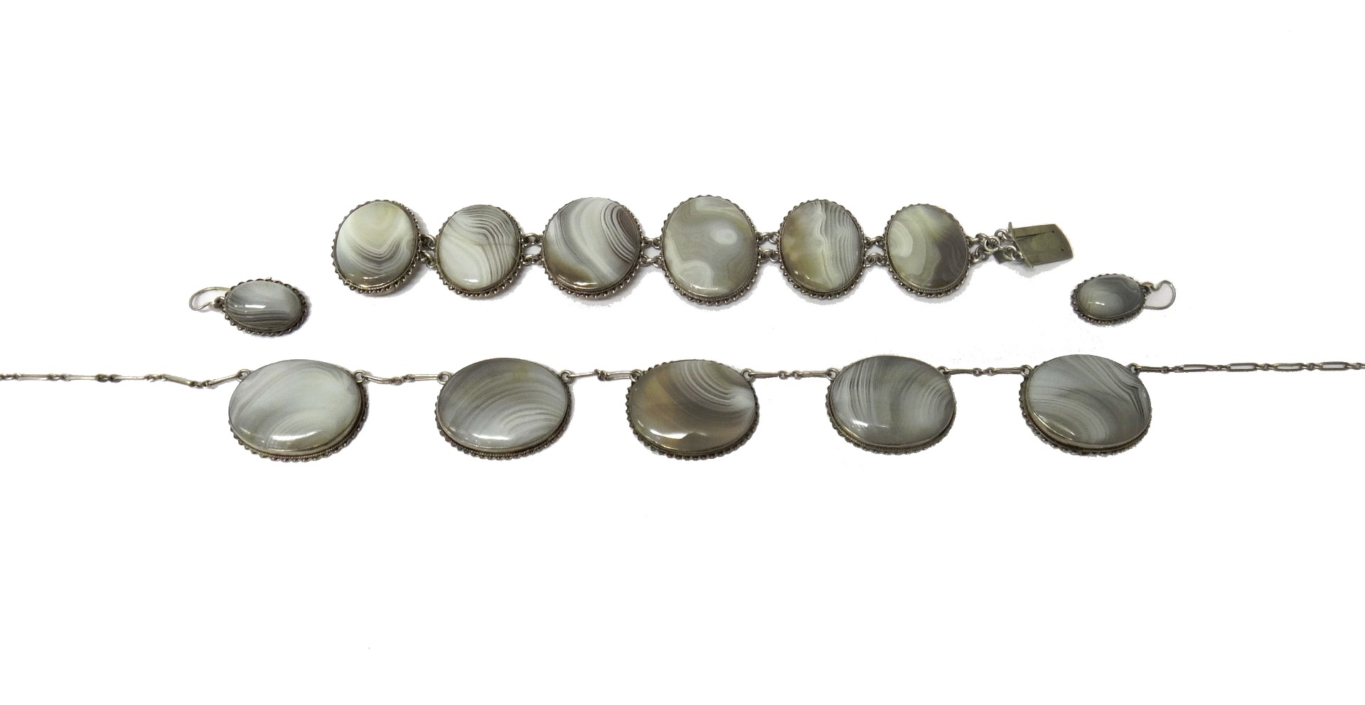 Appraisal: A banded grey agate suite of jewellery comprising a five