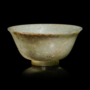 Appraisal: A Mottled Celadon Jade Bowl MING DYNASTY - the mottled