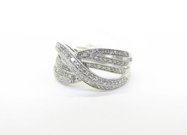 Appraisal: A K white gold diamond crossover band size dwt