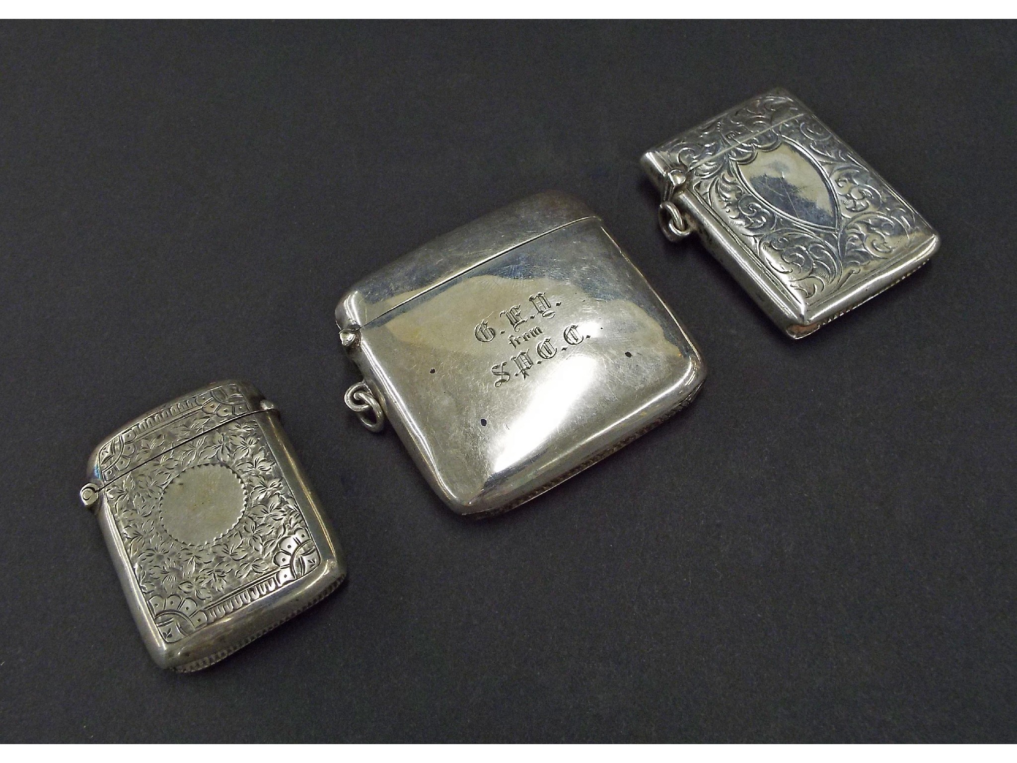 Appraisal: Three silver vesta cases oz approx