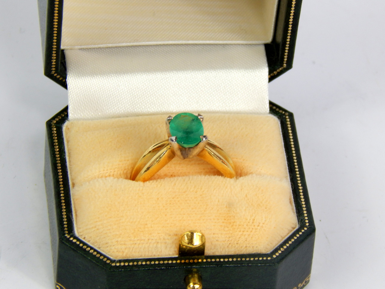 Appraisal: An emerald solitaire ring oval cut approximately ct claw set