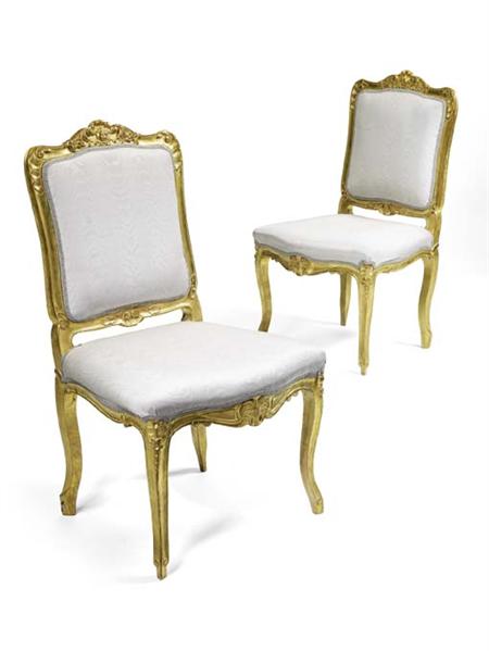 Appraisal: A pair of th century French giltwood framed side chairs