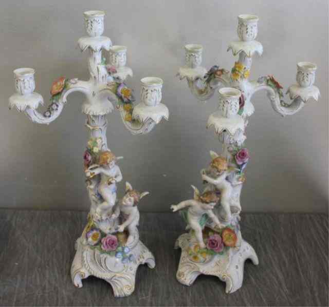 Appraisal: Pair of German Porcelain Putti Candelabra Marked Germany underneath From