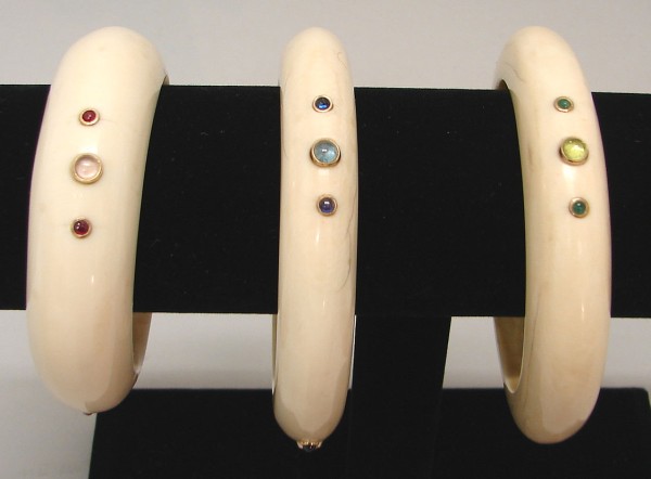 Appraisal: Grouping of three Ivory bangle inset with blue green and