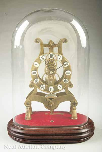 Appraisal: A Brass Lyre-Form Musical Skeleton Clock with Dome th c