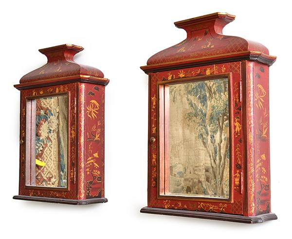 Appraisal: A PAIR OF RED LACQUERED WALL CABINETS with a shaped