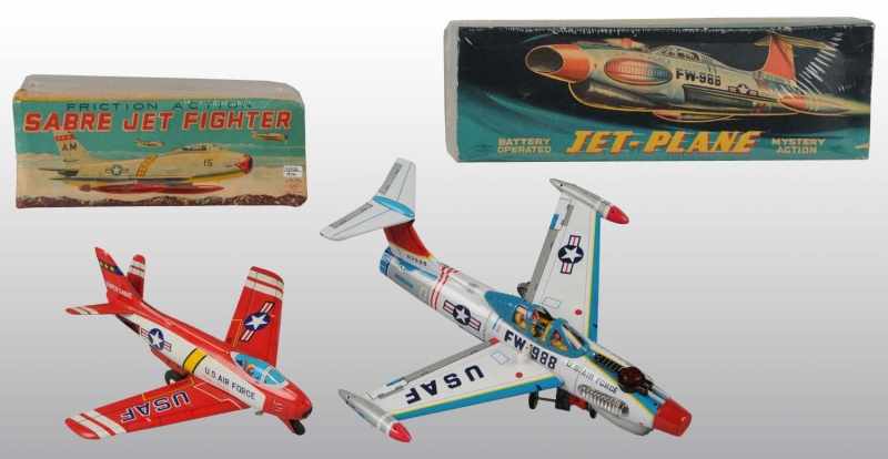 Appraisal: Lot of Tin Airplane Toys Description Japanese Working Includes one