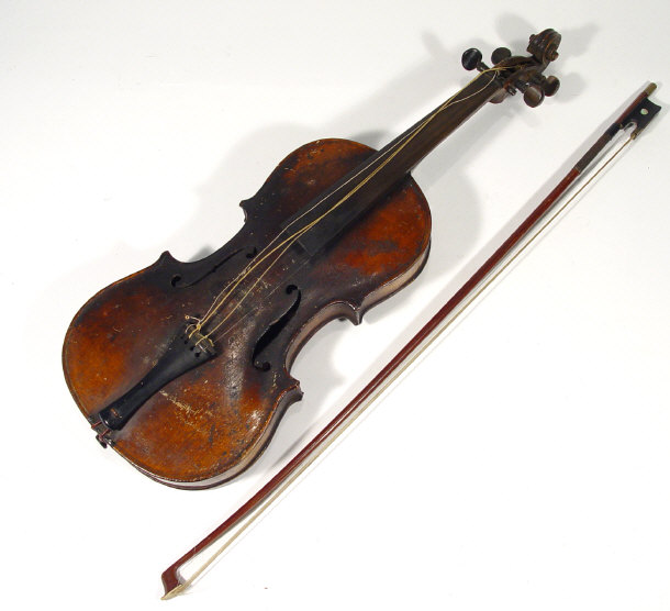 Appraisal: Old violin with two piece back together with a bow