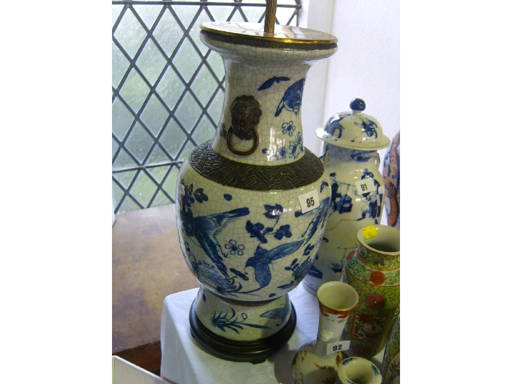 Appraisal: A th century oriental vase with blue and white painted