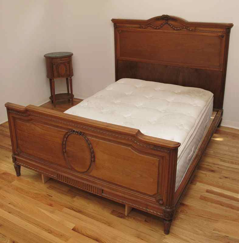 Appraisal: CARVED FRENCH BED AND NIGHTSTAND Head and foot boards carved