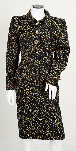 Appraisal: A s black and gold two piece Yves Saint Laurent