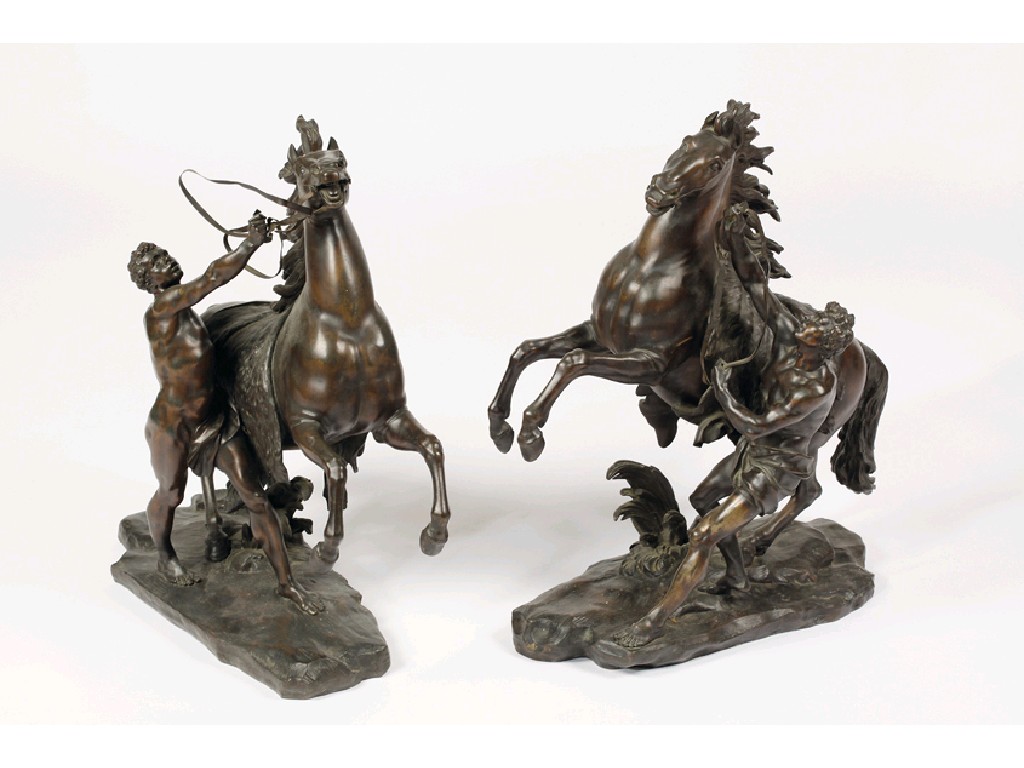 Appraisal: A PAIR OF BRONZE MARLEY HORSES after Cousteau each of