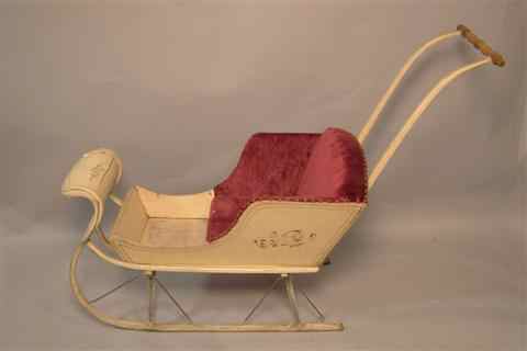 Appraisal: ANTIQUE CHILDREN'S SLEIGH having a red velvet seat composed of