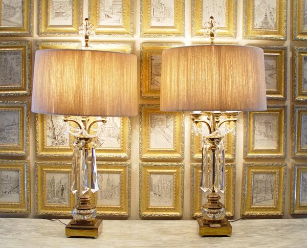 Appraisal: A FINE PAIR OF BRASS AND CRYSTAL LAMPS Enhanced with