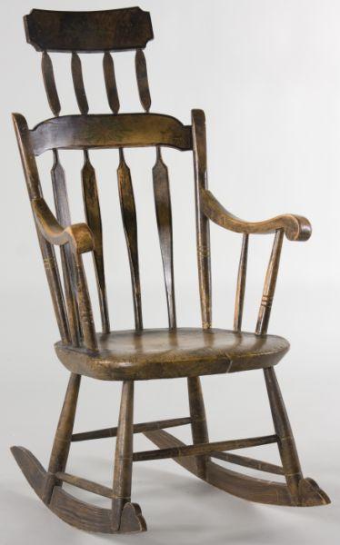 Appraisal: American Comb Arrow Back Rocking Chair early th century mixed