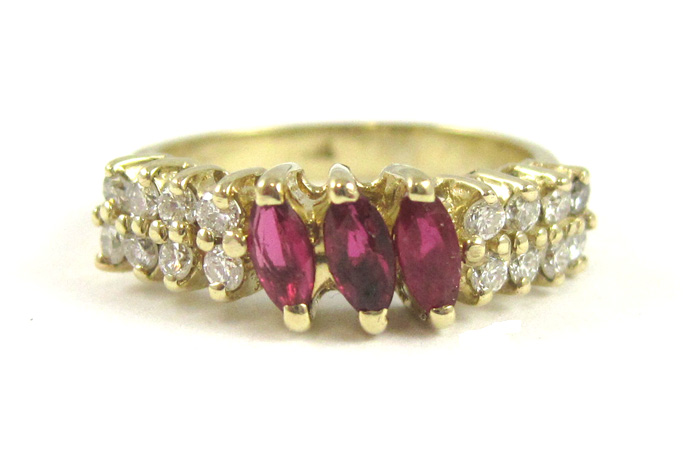 Appraisal: RUBY DIAMOND AND FOURTEEN KARAT GOLD RING centering three marquise-cut