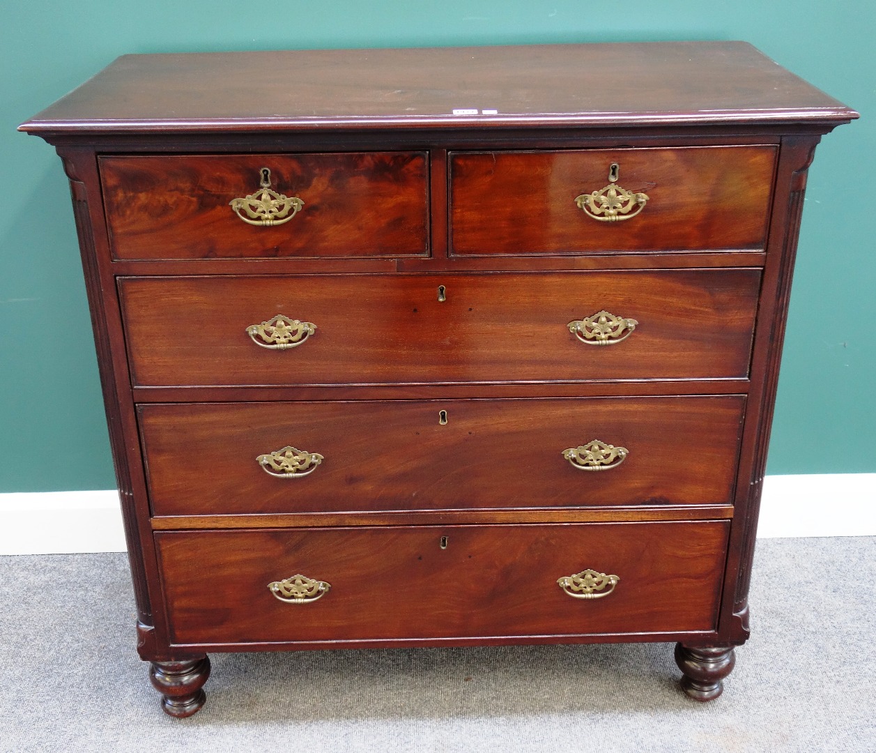 Appraisal: A late George III mahogany chest of two short and