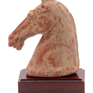 Appraisal: A Chinese Red Pottery Head of a Horse HAN DYNASTY