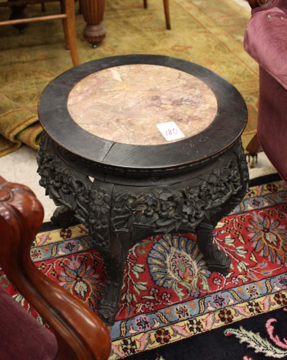 Appraisal: HIGHLY CARVED ROSEWOOD PEDESTAL TABLE Chinese export early th century