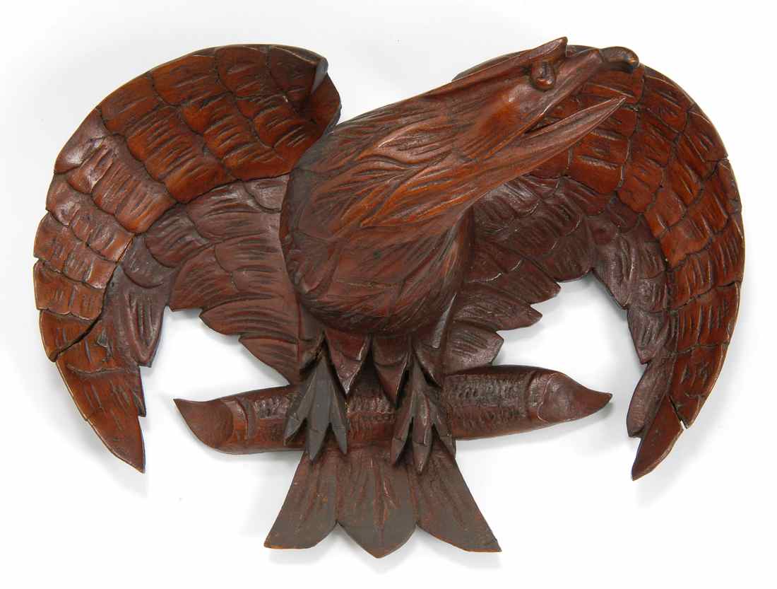 Appraisal: CARVED WOOD EAGLE FIGURE Early th CenturyWith spread wings Mahogany