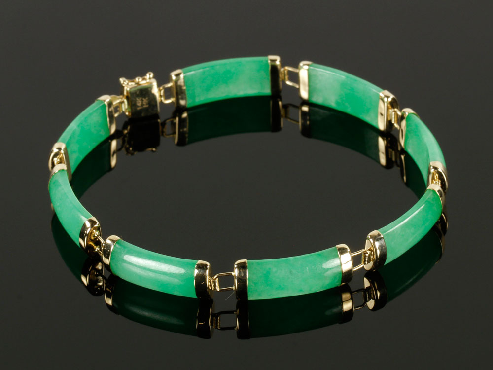 Appraisal: A - K Gold and Green Jadeite Bracelet K gold