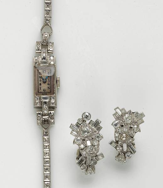 Appraisal: A pair of platinum and diamond earrings together with a