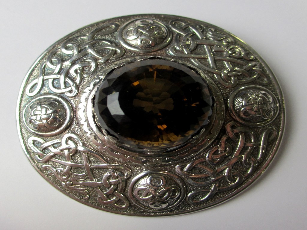 Appraisal: A large silver pated knotwork circular plaid pin in the