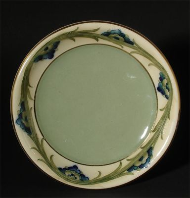 Appraisal: A Macintyre plate designed by William Moorcroft painted with a