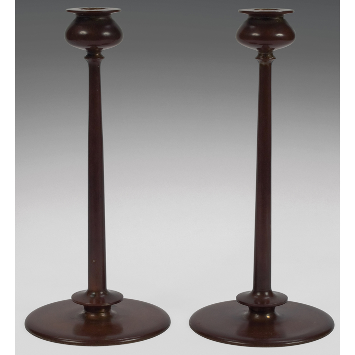 Appraisal: Arts and Crafts candlesticks pair similar to Jarvie Beta model