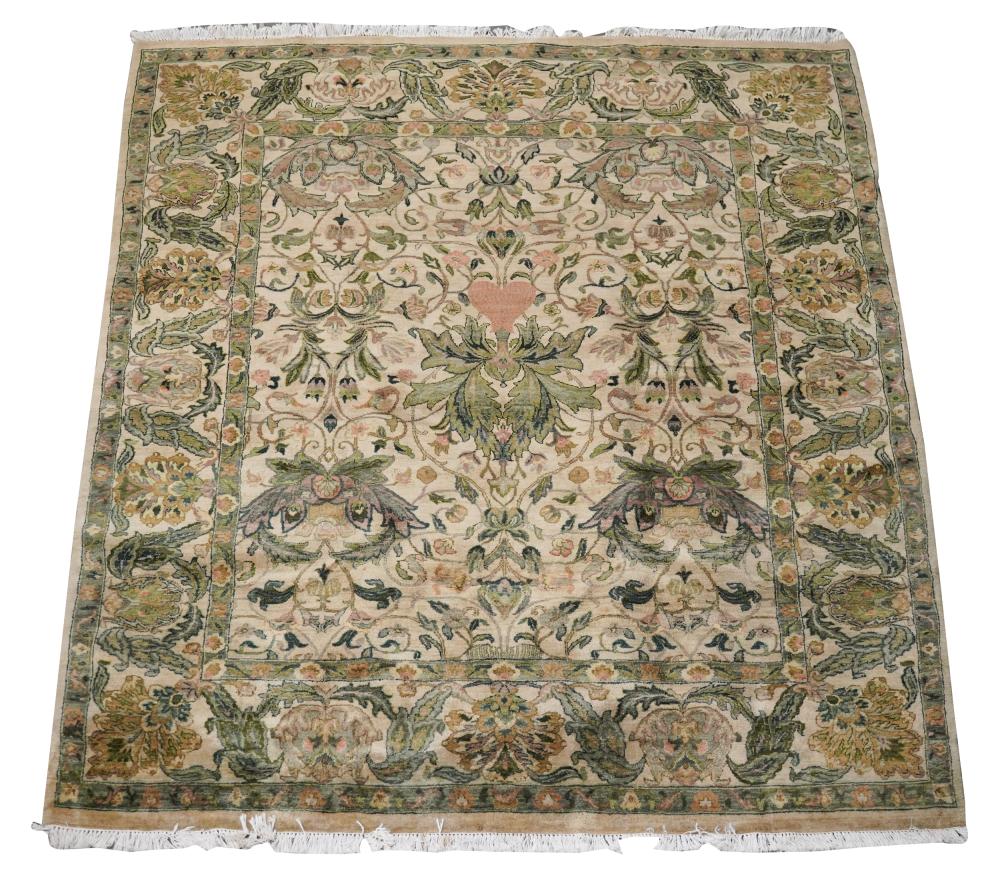 Appraisal: BEIGE FIELD AREA RUGwool with green and gilt floral decoration