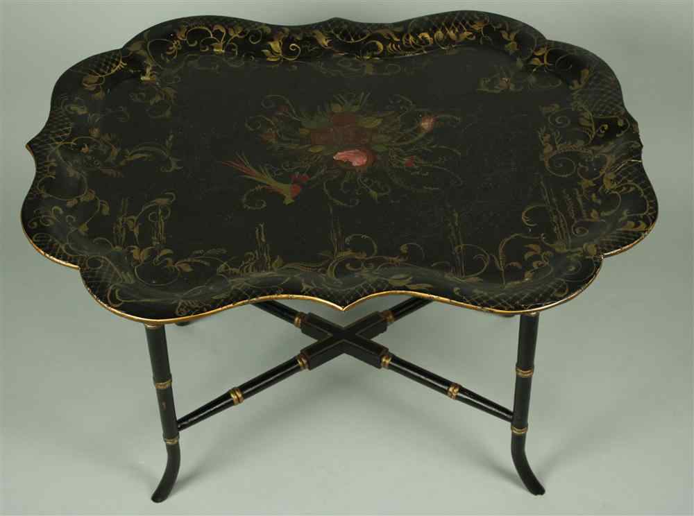 Appraisal: ENGLISH BLACK LACQUER PAPIER MACHE TRAY TABLE having shaped edges