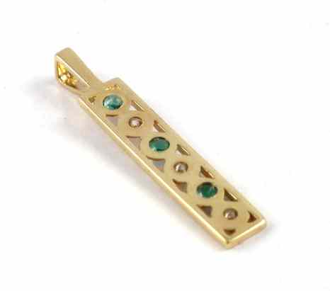 Appraisal: EMERALD DIAMOND AND YELLOW GOLD PENDANT k gold set with