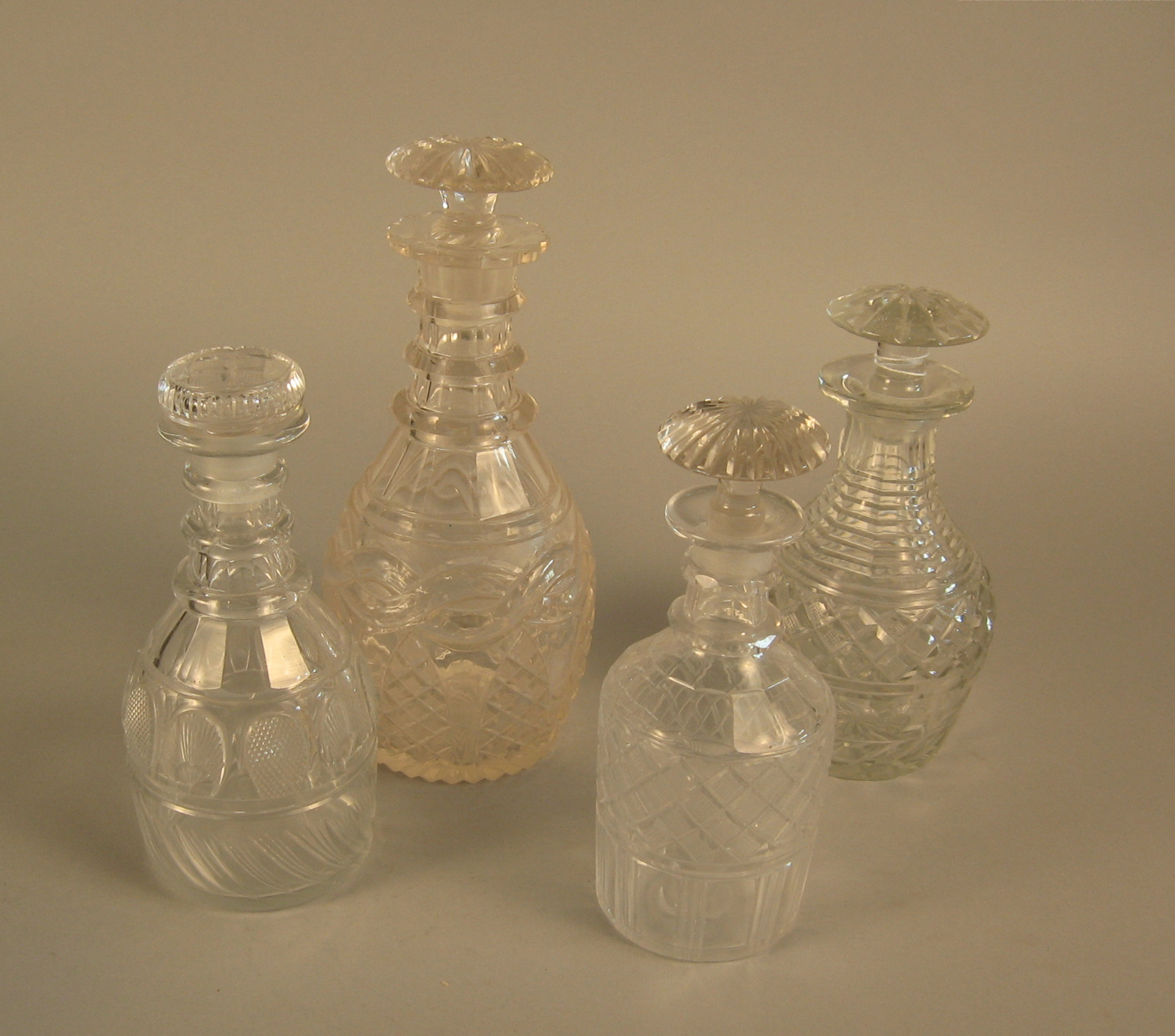 Appraisal: Group of four cut glass decanters english or irish th