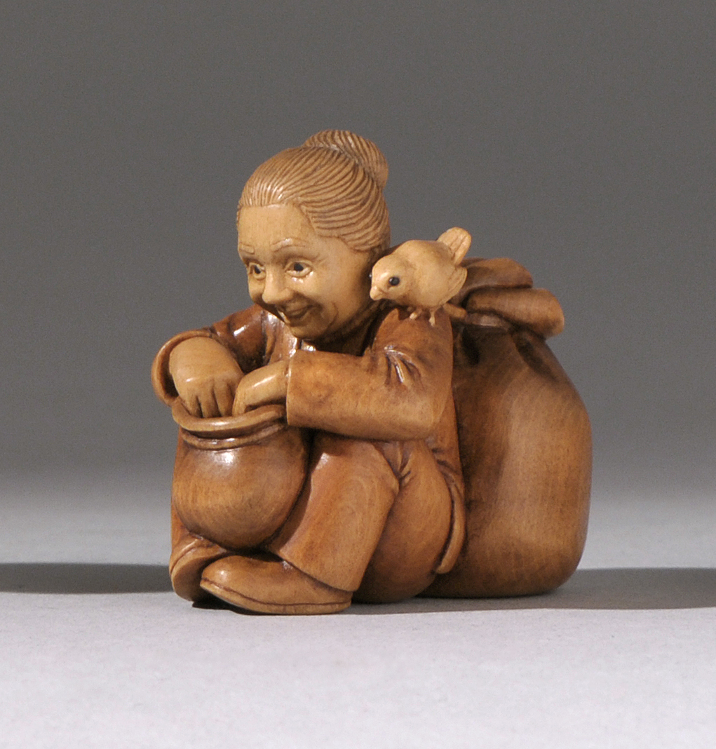 Appraisal: WOOD NETSUKE ContemporaryBy Susan Wright Depicting a seated woman with