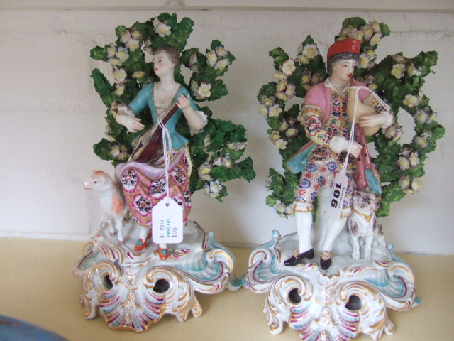 Appraisal: A pair of Sampson porcelain models of gallant and companion