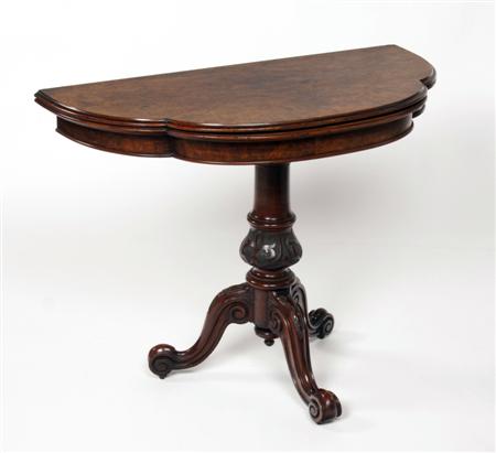 Appraisal: A Victorian burr walnut foldover card table the moulded top