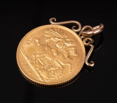 Appraisal: A George V half-sovereign with yellow metal scrolling pendant mount