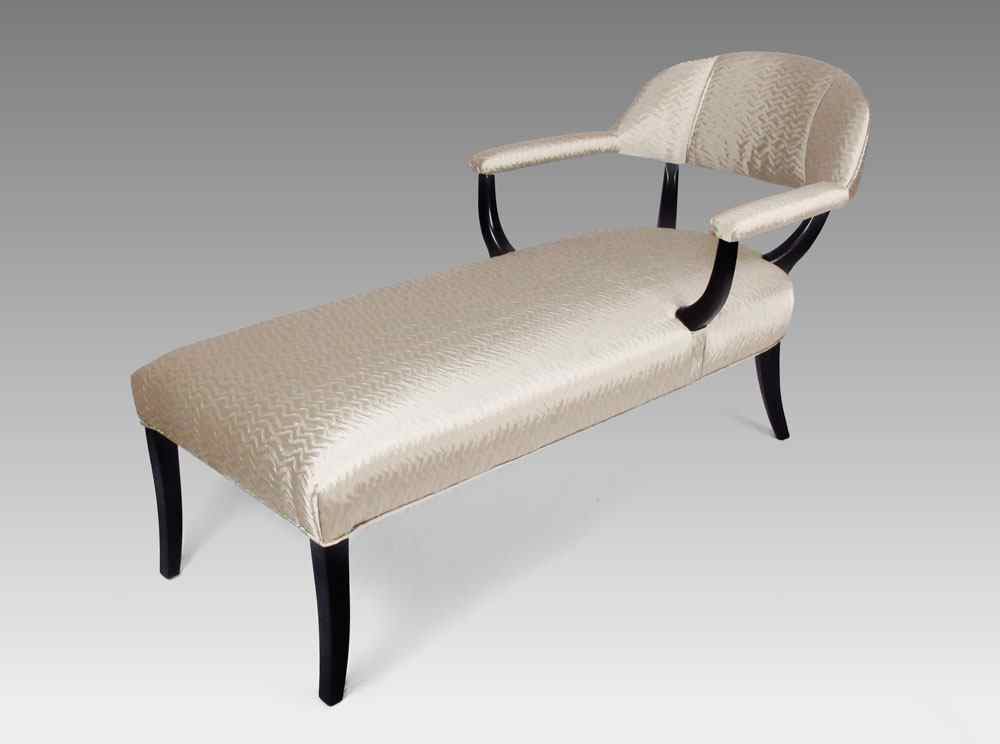 Appraisal: 'S HOLLYWOOD REGENCY STYLE CHAISE LOUNGE Ebonized arm back supports