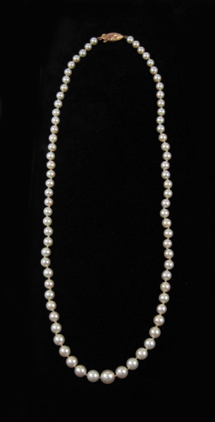 Appraisal: PRINCESS LENGTH GRADUATED PEARL NECKLACE strung with white pearls measuring