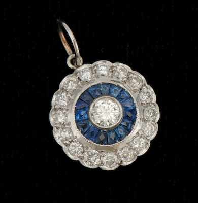 Appraisal: A Ladies' Platinum Diamond and Sapphire Pendant Platinum mounted round