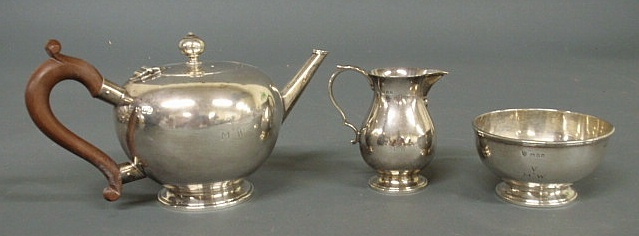 Appraisal: Three-piece tea service English sterling silver- teapot h creamer h