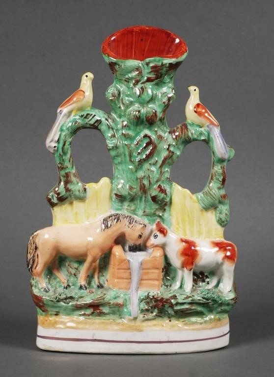 Appraisal: ANTIQUE STAFFORDSHIRE GOOD COMPANIONS SPILL VASEStaffordshire figural group of horse