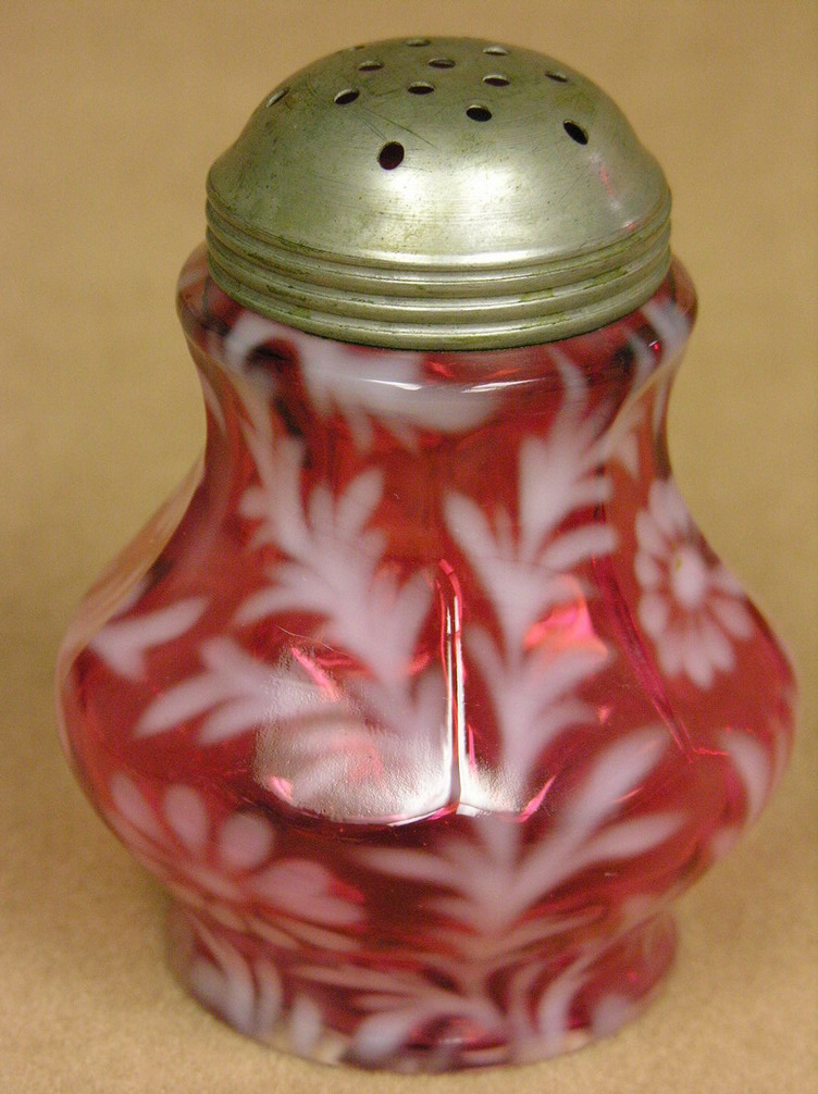 Appraisal: CRANBERRY OPALESCENT DAISY AND FERN SHAKER The shaker is h