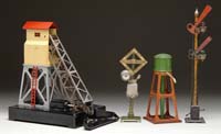 Appraisal: FOUR LIONEL ACCESSORIES COAL LOADER SEMAPHORE RINGING BELL SIGNAL AND