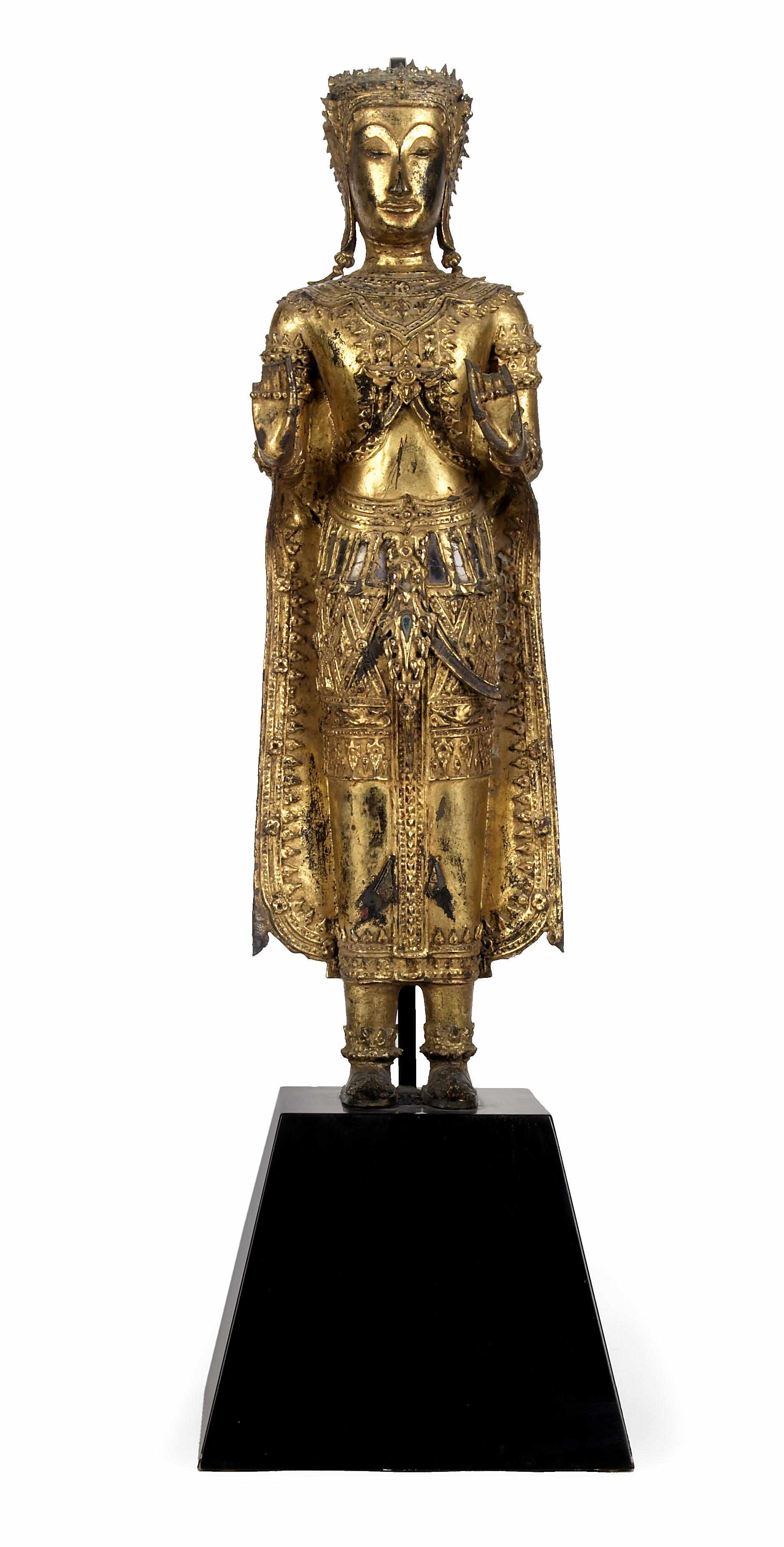 Appraisal: A Thai Bangkok style standing gilt bronze figure of Buddha