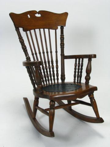 Appraisal: Child's Antique Oak Spindle Back Rocker with embossed leather seats