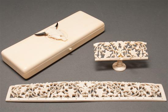 Appraisal: Carved ivory pen box Continental floral carved ivory reticulated miniature