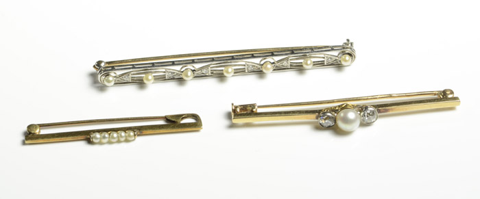 Appraisal: THREE PEARL AND GOLD BAR PINS including one k yellow